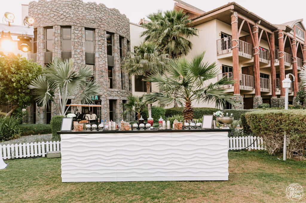 White Wave mobile bar with sculpted flowing texture.